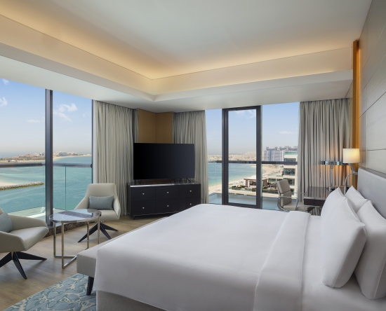 Suite mit einem Schlafzimmer mit Meerblick
